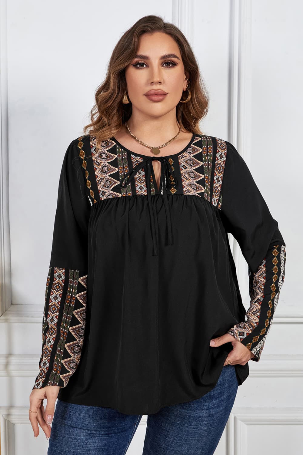 Melo Apparel Plus Size Printed Round Neck Tie Front Blouse